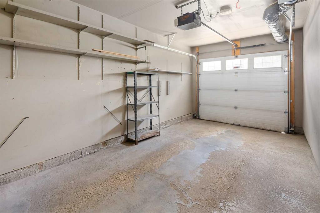 2504-7171 Coach Hill Road, Calgary, AB - Indoor Photo Showing Garage
