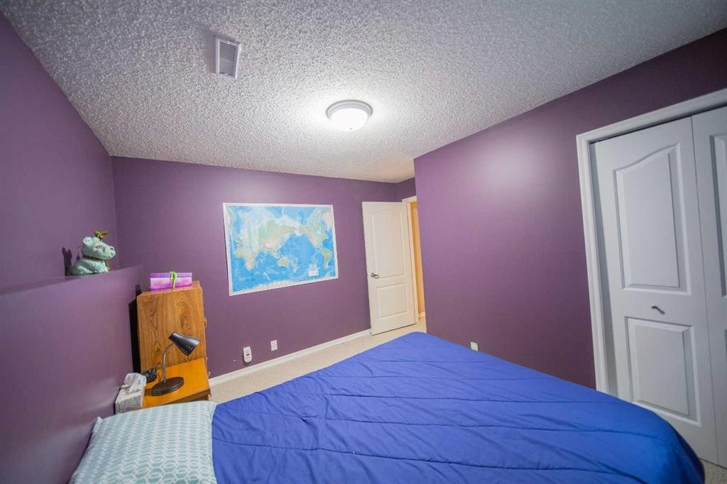 272 Covington Road Ne, Calgary, AB - Indoor Photo Showing Bedroom