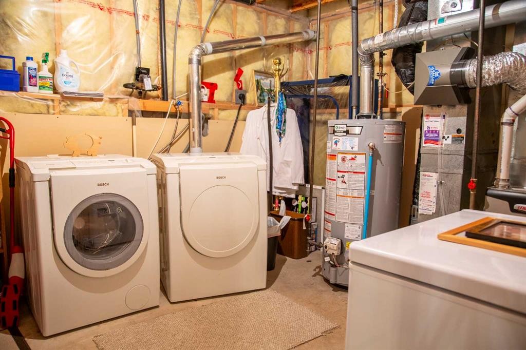 272 Covington Road Ne, Calgary, AB - Indoor Photo Showing Laundry Room