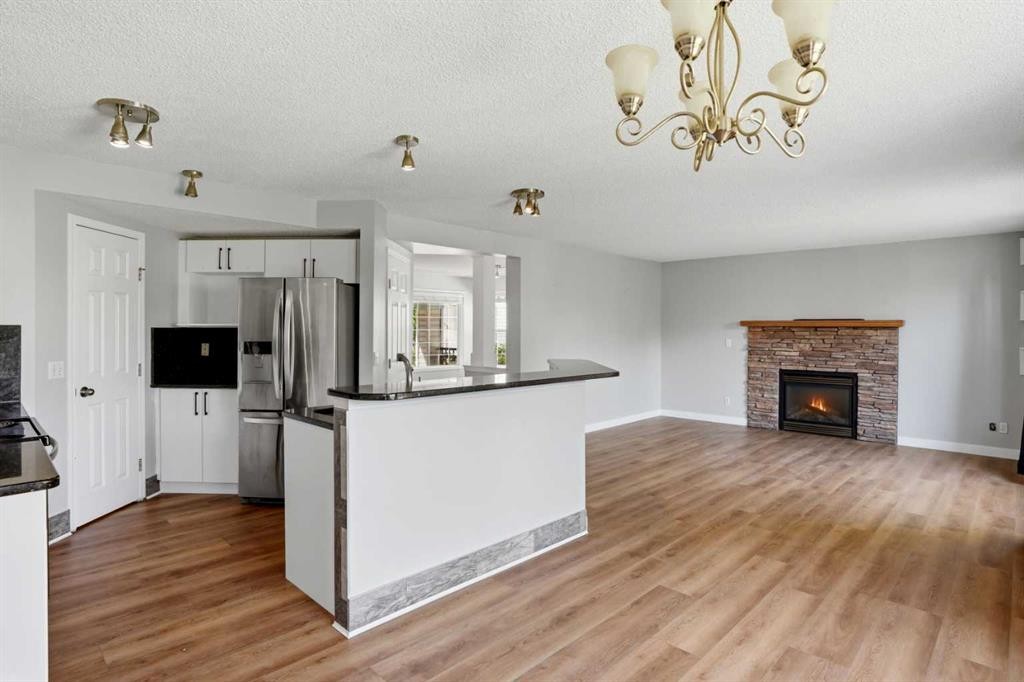 141 Shannon Square Sw, Calgary, AB - Indoor With Fireplace