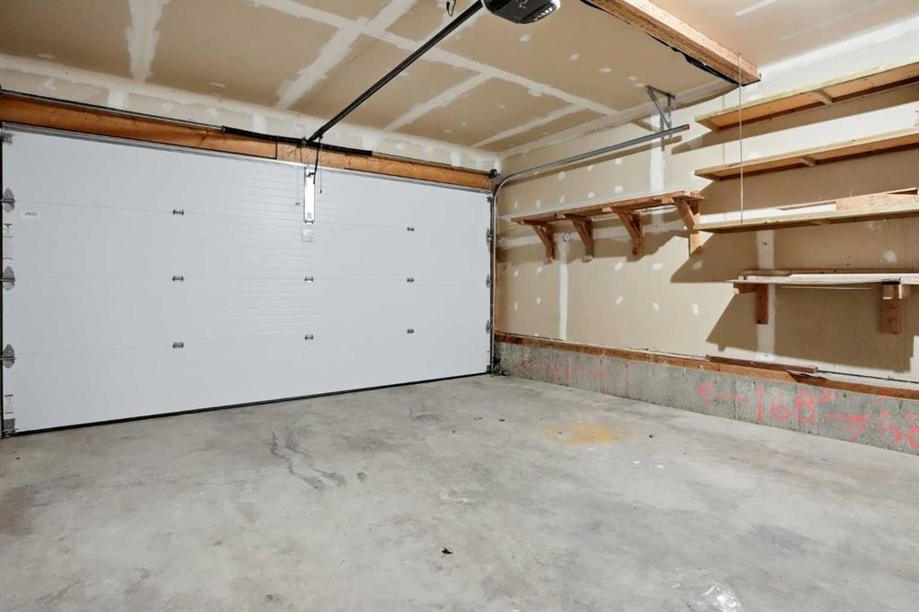 141 Shannon Square Sw, Calgary, AB - Indoor Photo Showing Garage