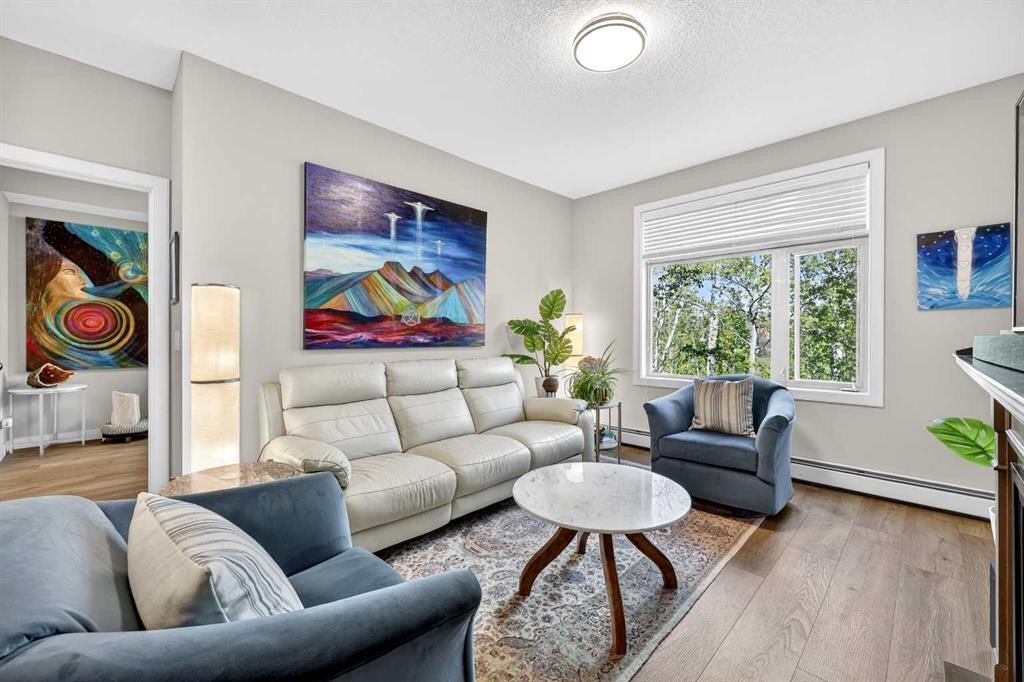 216-35 Aspenmont Heights Sw, Calgary, AB - Indoor Photo Showing Living Room