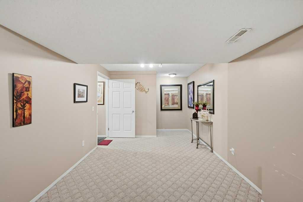 86 Saddlecrest Close Ne, Calgary, AB - Indoor Photo Showing Other Room