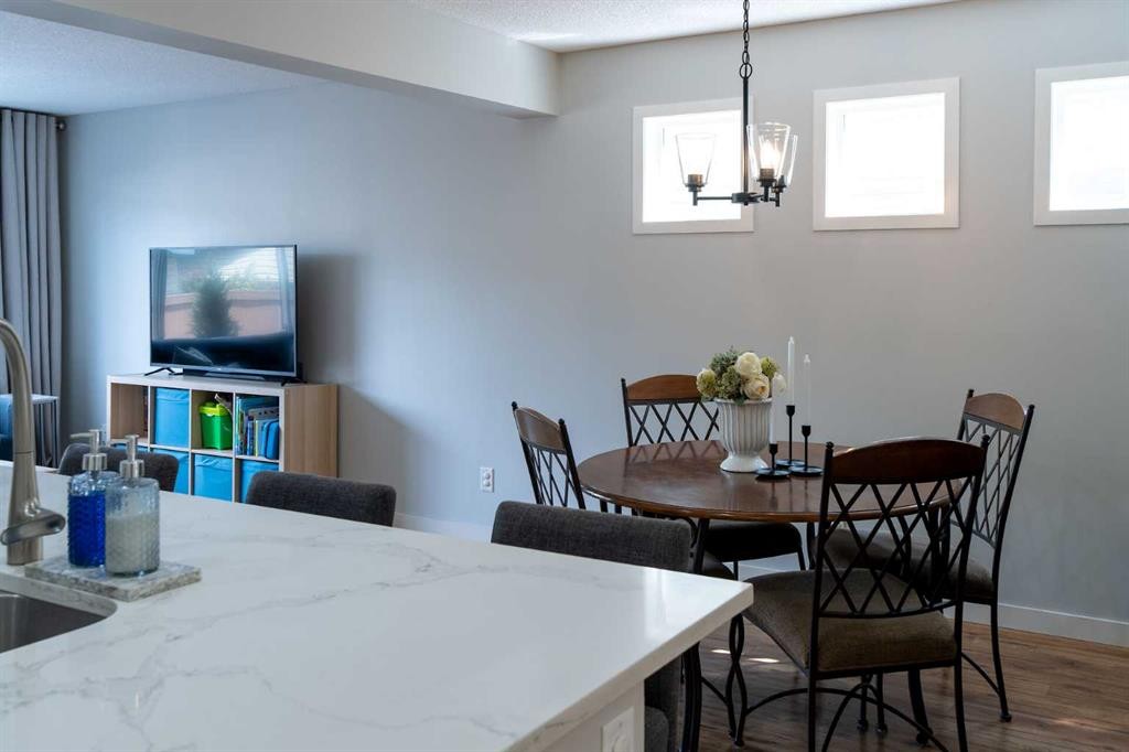 24 Copperpond Road Se, Calgary, AB - Indoor Photo Showing Dining Room