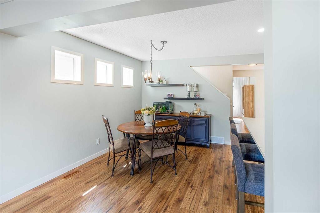 24 Copperpond Road Se, Calgary, AB - Indoor Photo Showing Dining Room