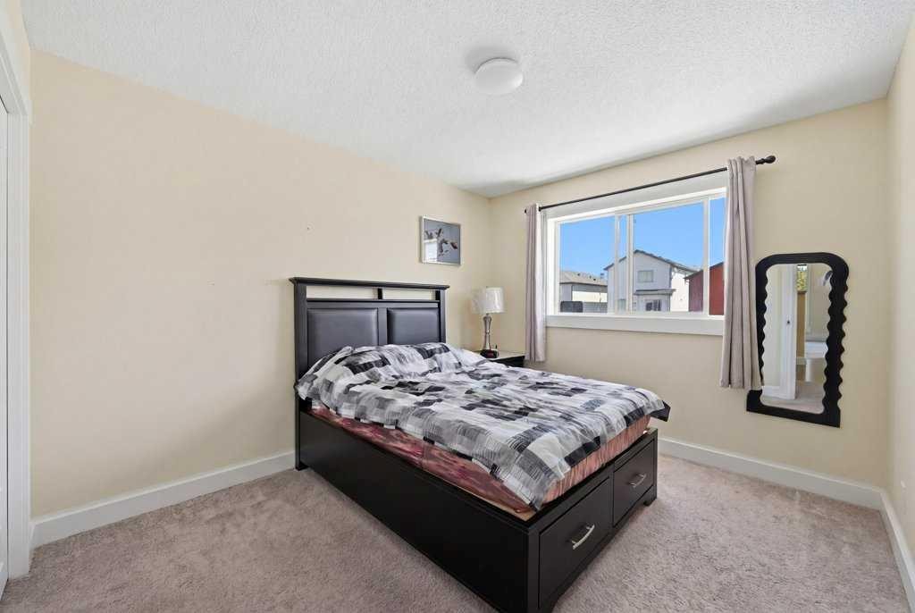 141 Martin Crossing Crescent Ne, Calgary, AB - Indoor Photo Showing Bedroom