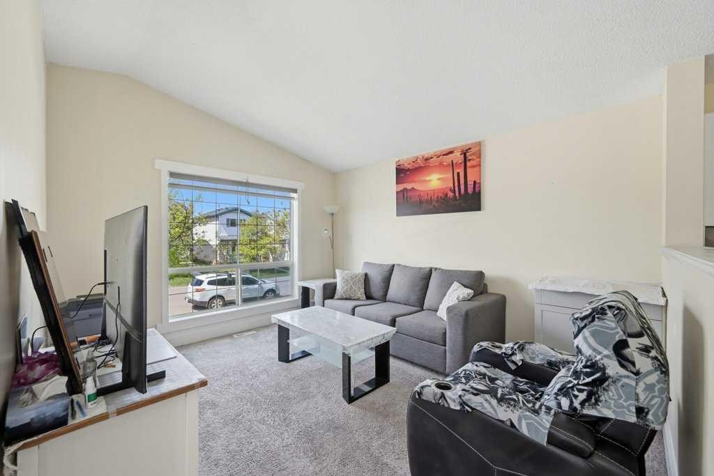141 Martin Crossing Crescent Ne, Calgary, AB - Indoor Photo Showing Living Room