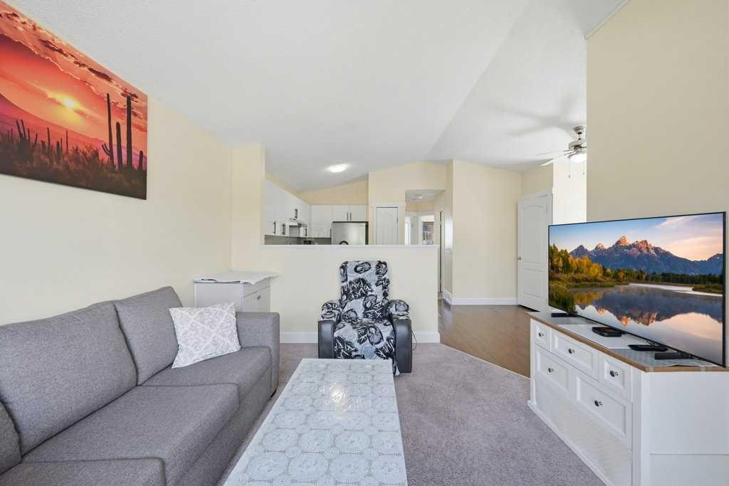 141 Martin Crossing Crescent Ne, Calgary, AB - Indoor Photo Showing Living Room