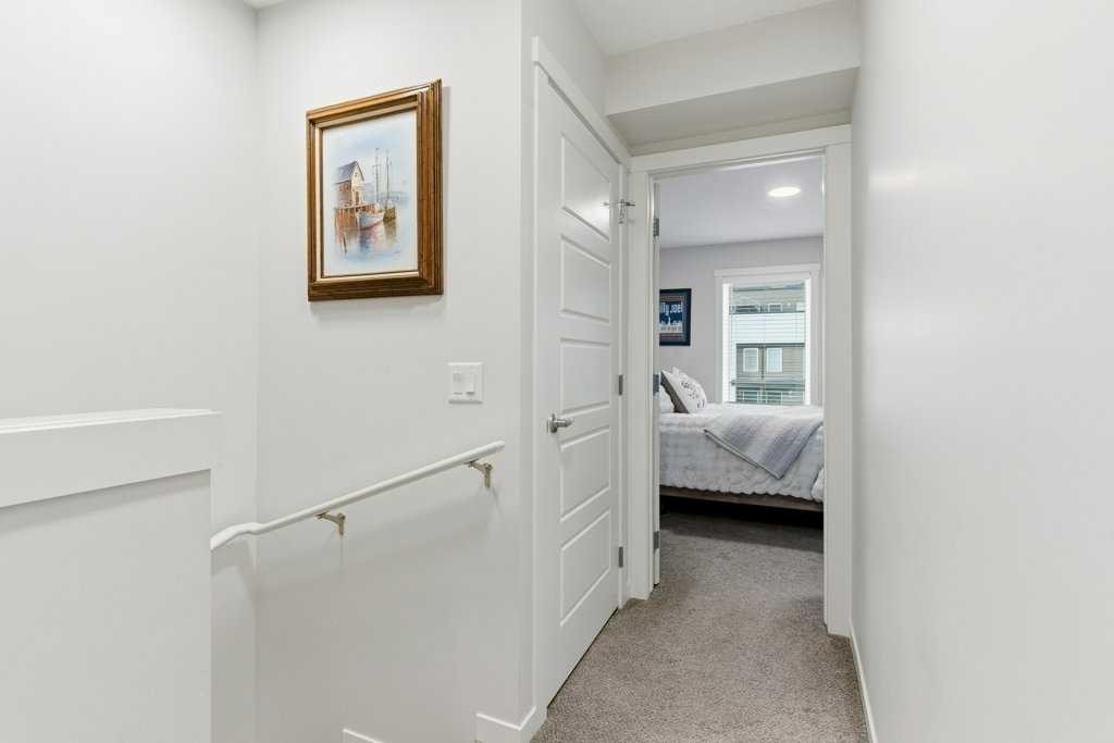 410-338 Seton Circle Se, Calgary, AB - Indoor Photo Showing Other Room