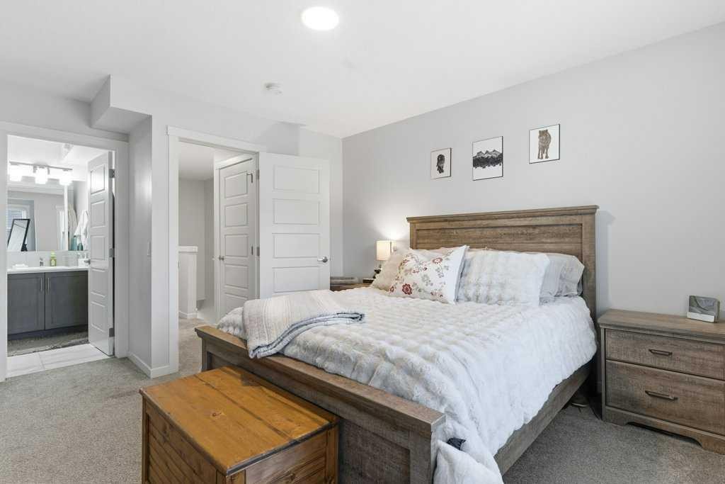 410-338 Seton Circle Se, Calgary, AB - Indoor Photo Showing Bedroom
