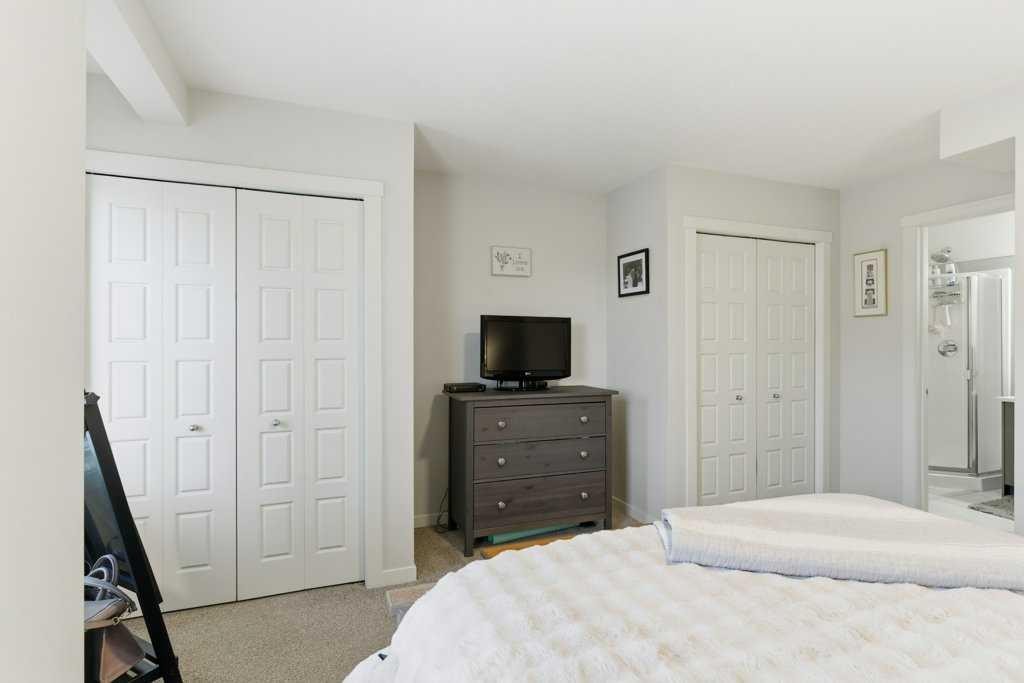 410-338 Seton Circle Se, Calgary, AB - Indoor Photo Showing Bedroom