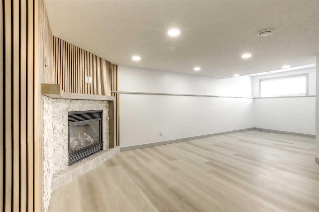 81 Coventry Circle Ne, Calgary, AB - Indoor With Fireplace