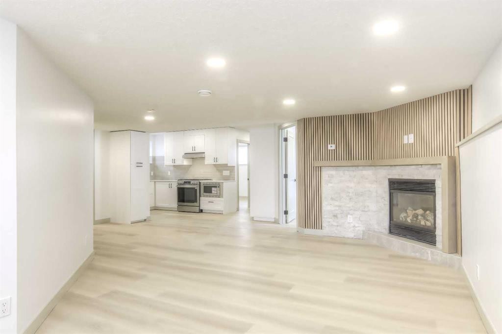 81 Coventry Circle Ne, Calgary, AB - Indoor With Fireplace