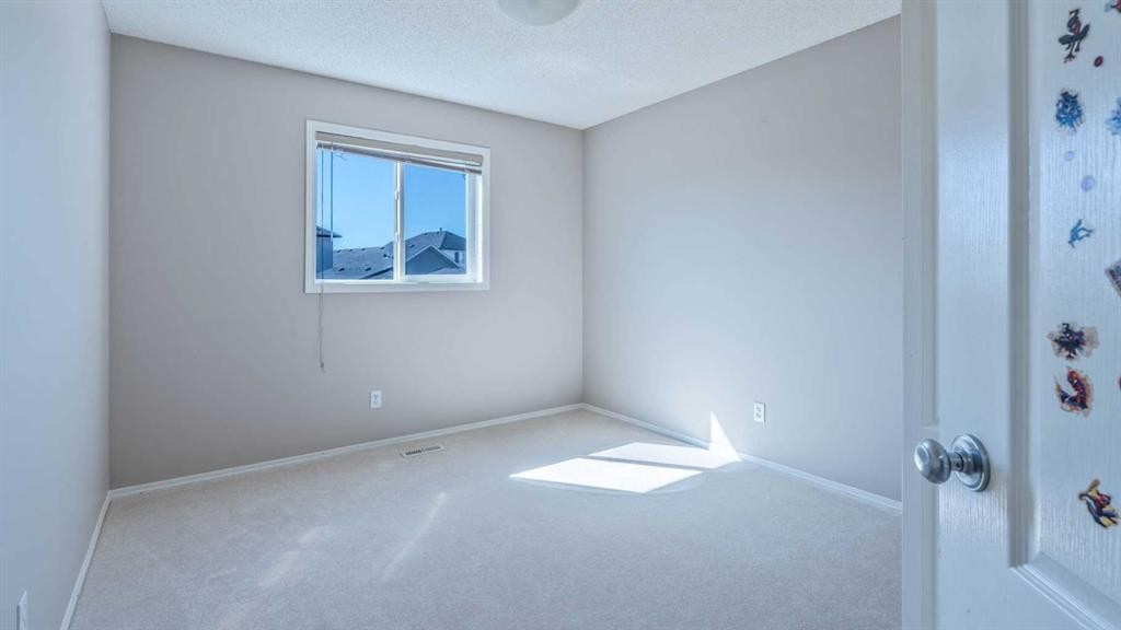 23 Taralake Road Ne, Calgary, AB - Indoor Photo Showing Other Room