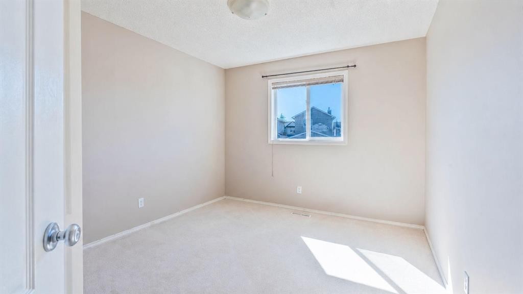 23 Taralake Road Ne, Calgary, AB - Indoor Photo Showing Other Room