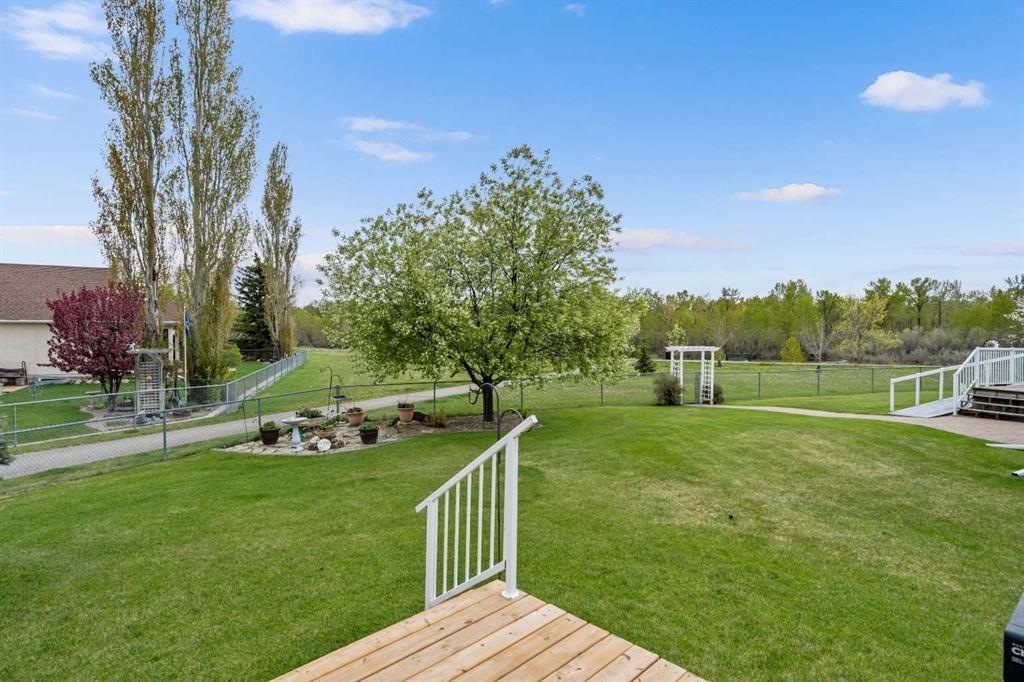 310 Riverside Garden Nw, High River, AB - Outdoor With Deck Patio Veranda