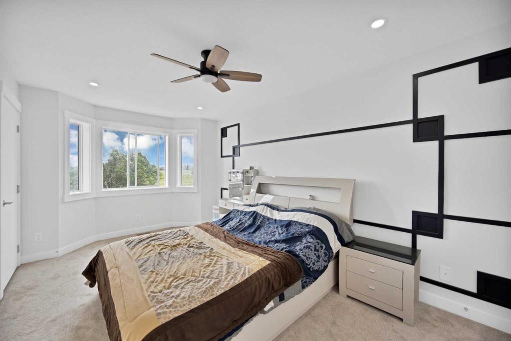 100 San Diego Green Ne, Calgary, AB - Indoor Photo Showing Bedroom