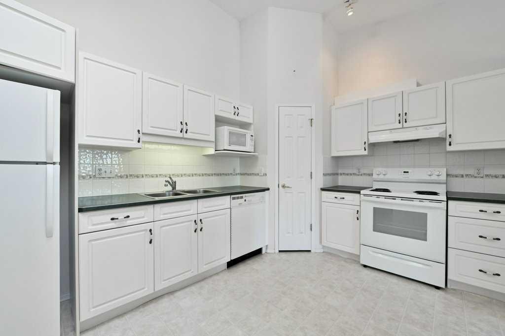 184 Valley Ridge Heights Nw, Calgary, AB - Indoor Photo Showing Kitchen With Double Sink