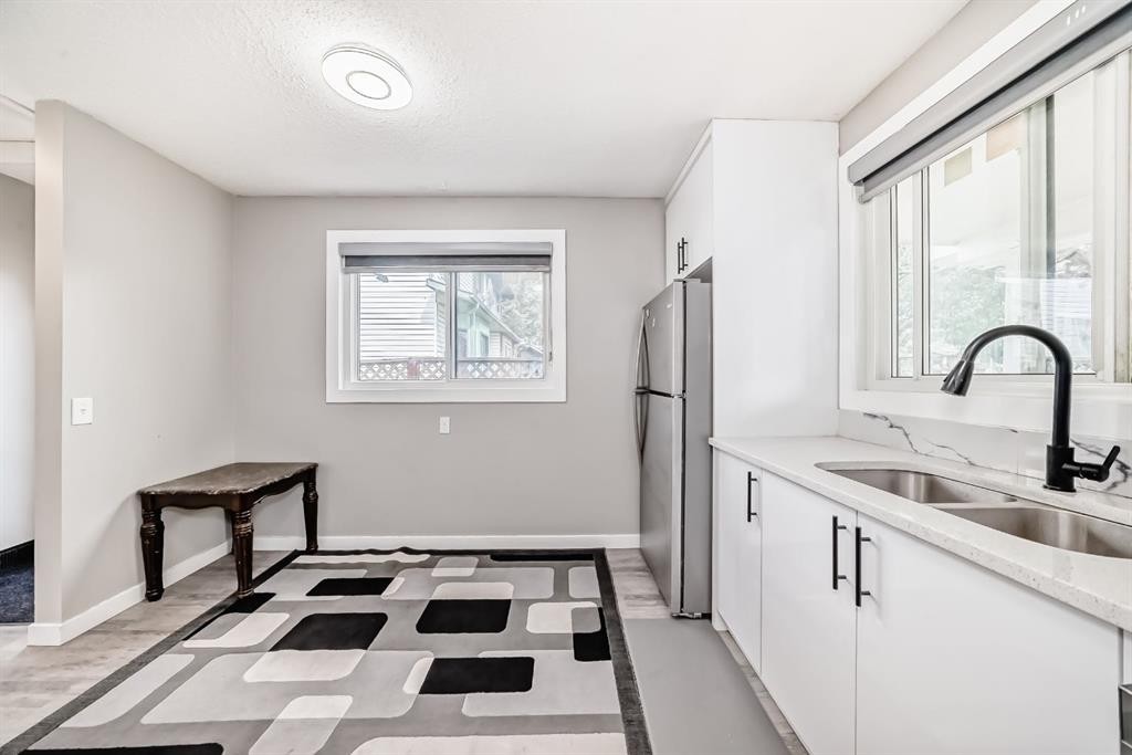 116 Pineson Place Ne, Calgary, AB - Indoor Photo Showing Kitchen With Double Sink