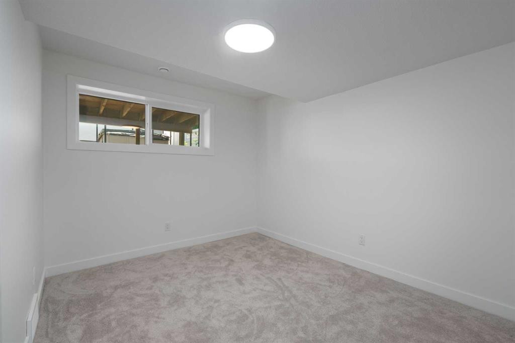 312 Queensland Road Se, Calgary, AB - Indoor Photo Showing Other Room