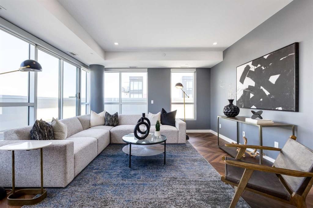 715-8445 Broadcast Avenue Sw, Calgary, AB - Indoor Photo Showing Living Room