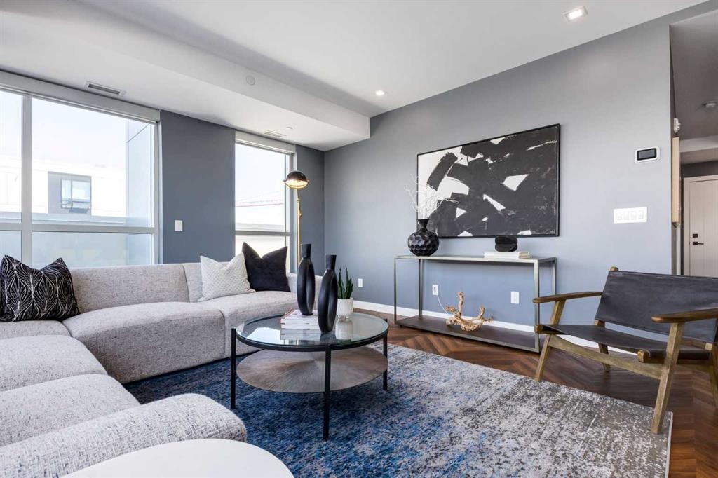 715-8445 Broadcast Avenue Sw, Calgary, AB - Indoor Photo Showing Living Room