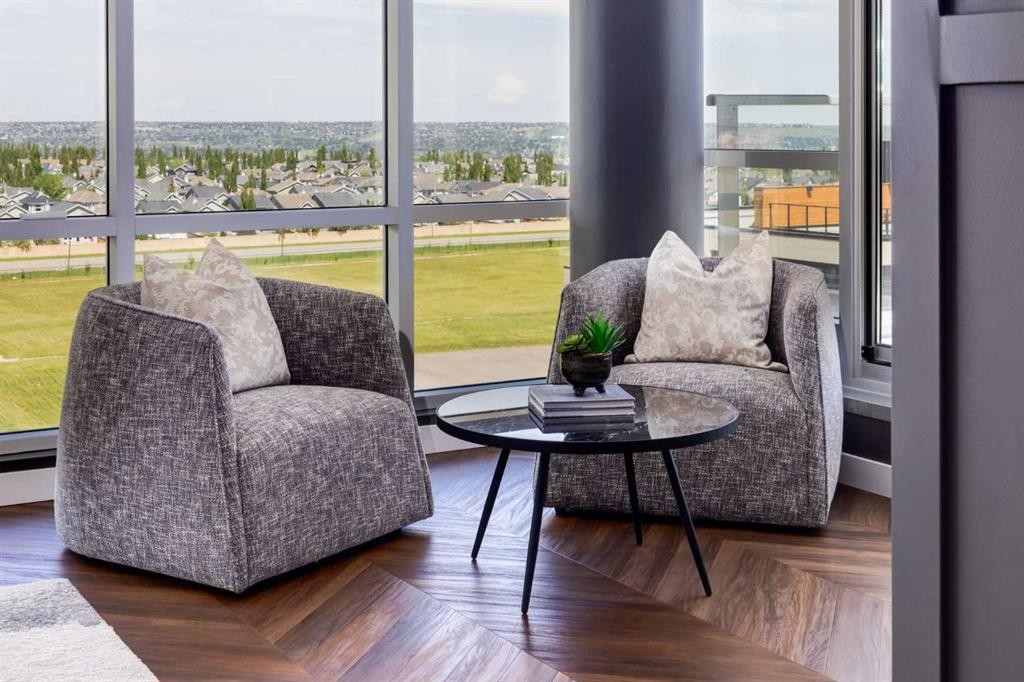 715-8445 Broadcast Avenue Sw, Calgary, AB - Indoor Photo Showing Living Room