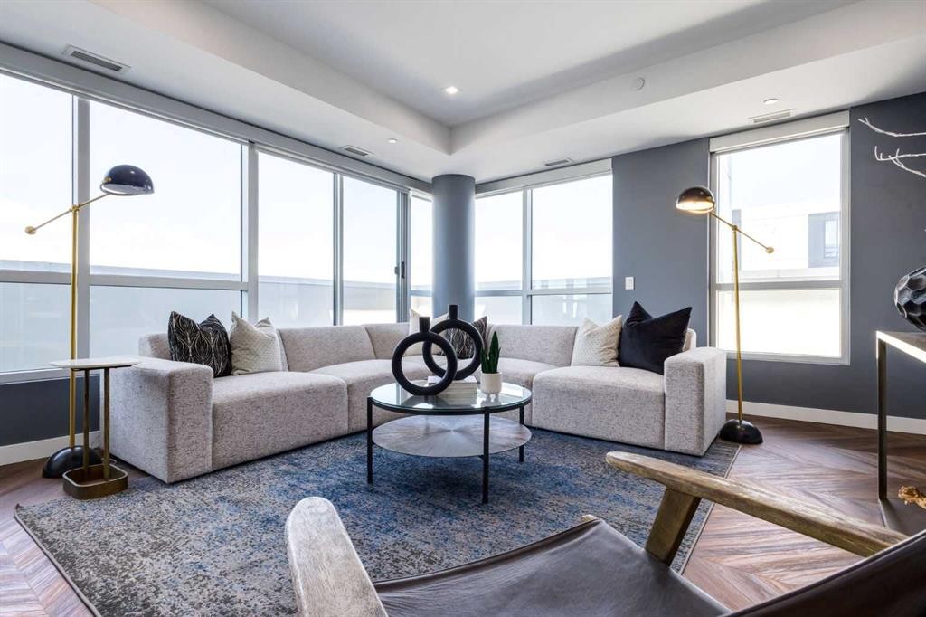 715-8445 Broadcast Avenue Sw, Calgary, AB - Indoor Photo Showing Living Room