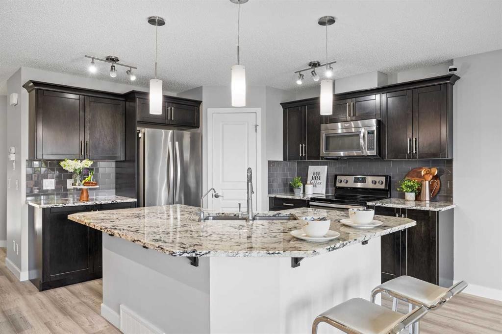 249 Auburn Meadows Place Se, Calgary, AB - Indoor Photo Showing Kitchen With Stainless Steel Kitchen With Upgraded Kitchen