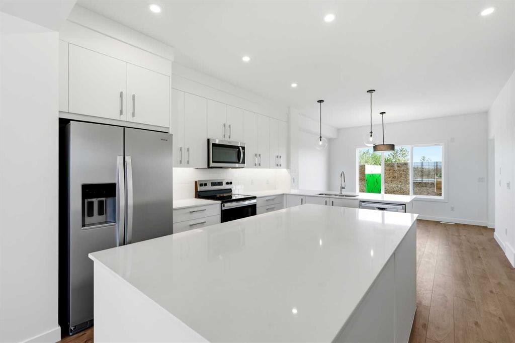 9993 Huxbury Drive Ne, Calgary, AB - Indoor Photo Showing Kitchen With Stainless Steel Kitchen With Upgraded Kitchen
