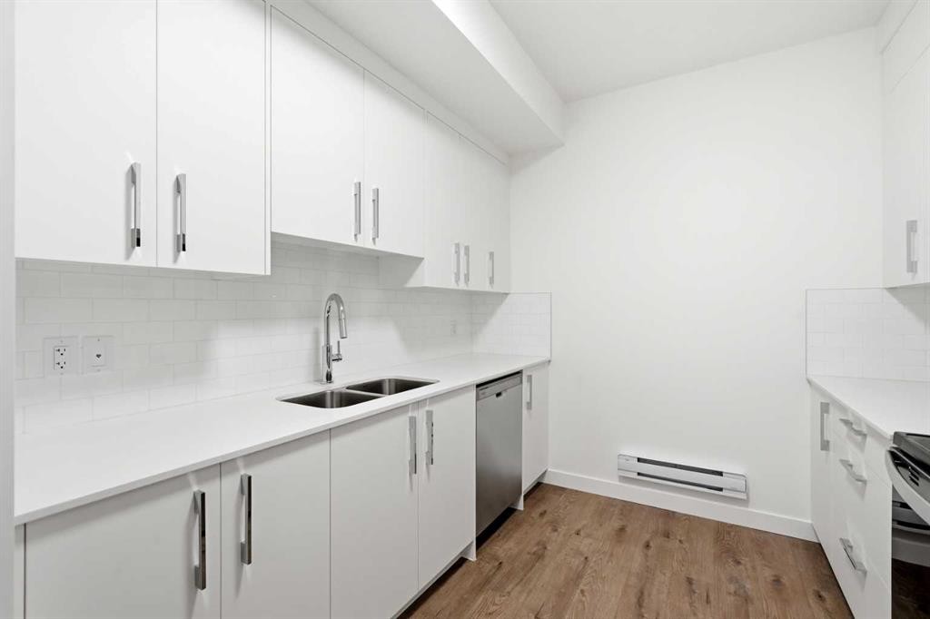 9993 Huxbury Drive Ne, Calgary, AB - Indoor Photo Showing Kitchen With Double Sink With Upgraded Kitchen