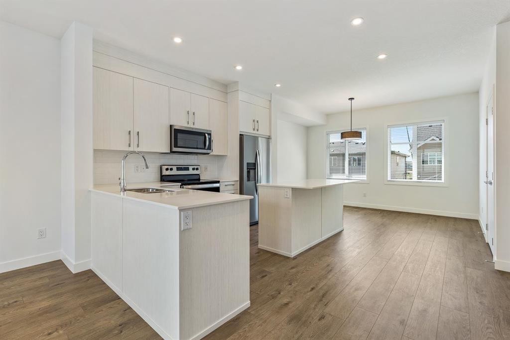 124-1862 Cornerstone Boulevard Ne, Calgary, AB - Indoor Photo Showing Kitchen With Stainless Steel Kitchen With Upgraded Kitchen