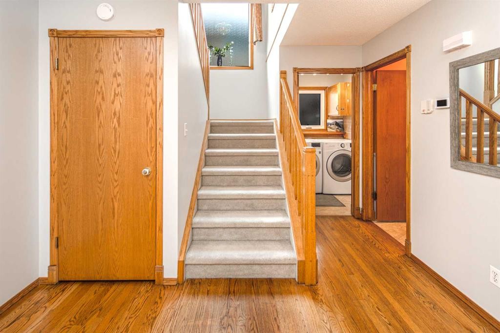 37 Arbour Summit Close Nw, Calgary, AB - Indoor Photo Showing Other Room