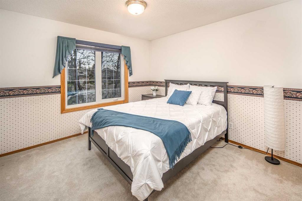 37 Arbour Summit Close Nw, Calgary, AB - Indoor Photo Showing Bedroom