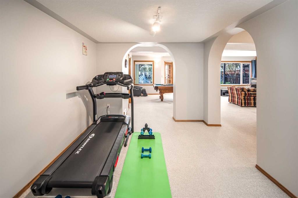 37 Arbour Summit Close Nw, Calgary, AB - Indoor Photo Showing Gym Room