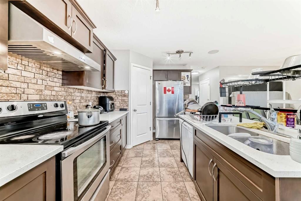 16 Skyview Springs Road Ne, Calgary, AB - Indoor Photo Showing Kitchen With Stainless Steel Kitchen With Double Sink