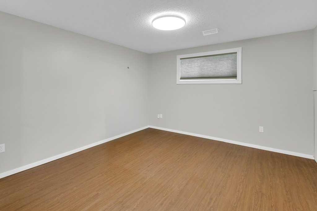 120 Alpine Crescent Se, Airdrie, AB - Indoor Photo Showing Other Room