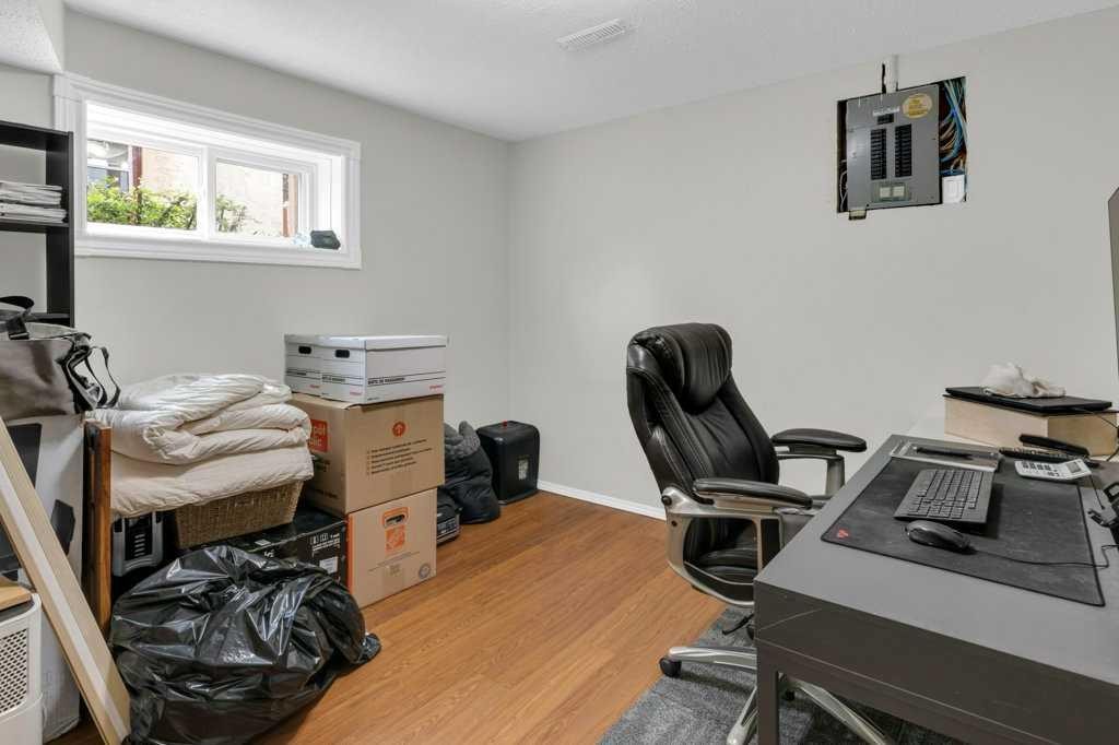 120 Alpine Crescent Se, Airdrie, AB - Indoor Photo Showing Office