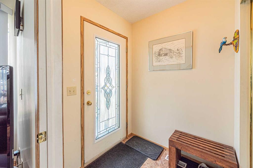 259 Carmel Close Ne, Calgary, AB - Indoor Photo Showing Other Room