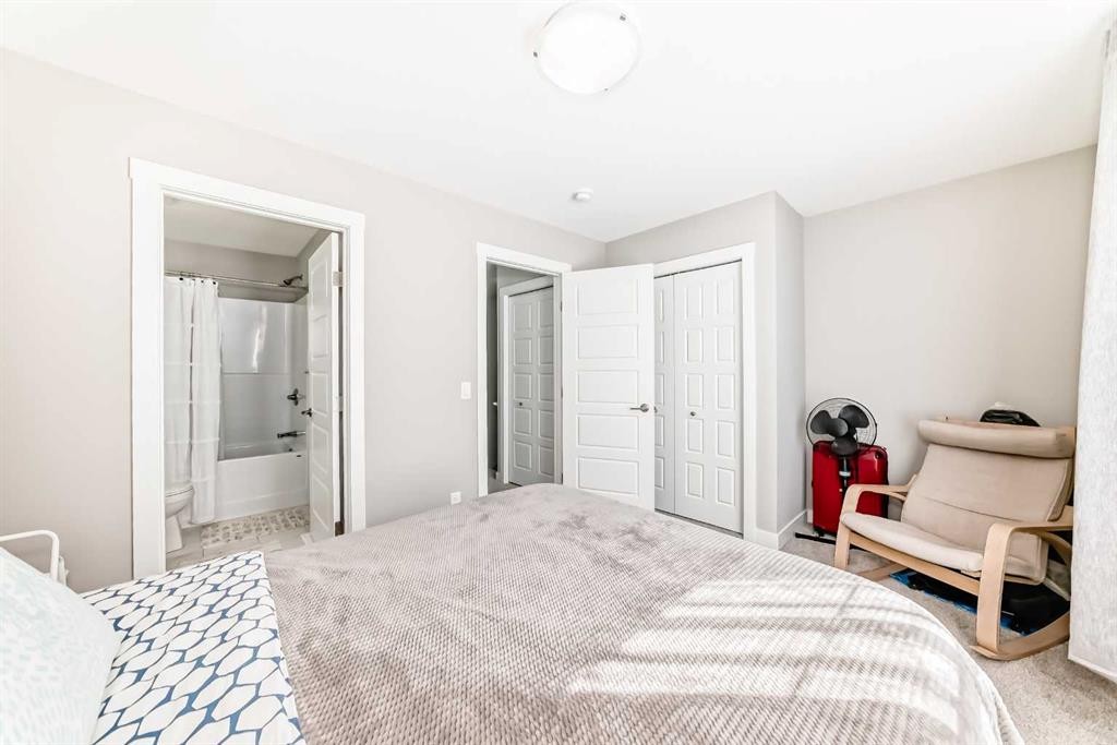 410 Cranbrook Walk Se, Calgary, AB - Indoor Photo Showing Bedroom