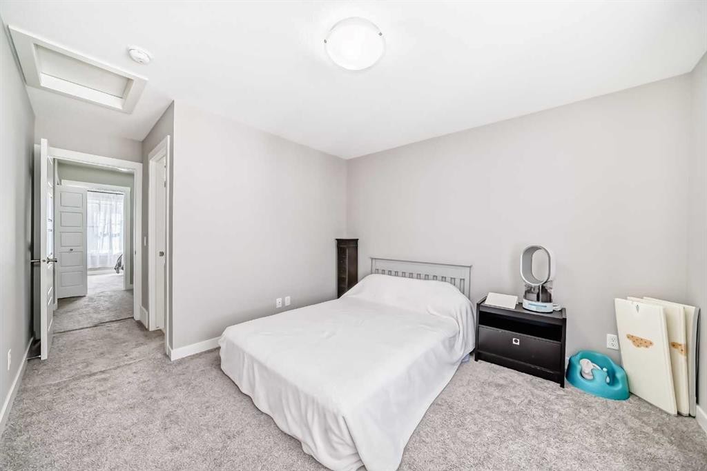 410 Cranbrook Walk Se, Calgary, AB - Indoor Photo Showing Bedroom