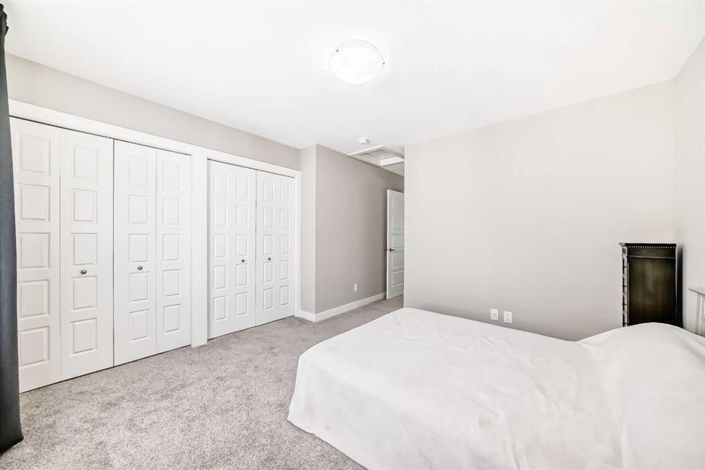 410 Cranbrook Walk Se, Calgary, AB - Indoor Photo Showing Bedroom