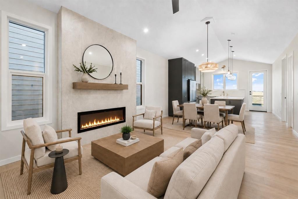 147 Marmot Grove Nw, Calgary, AB - Indoor Photo Showing Living Room With Fireplace