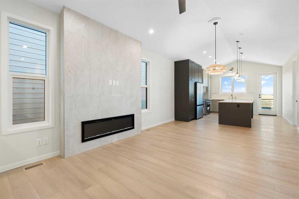 147 Marmot Grove Nw, Calgary, AB - Indoor With Fireplace