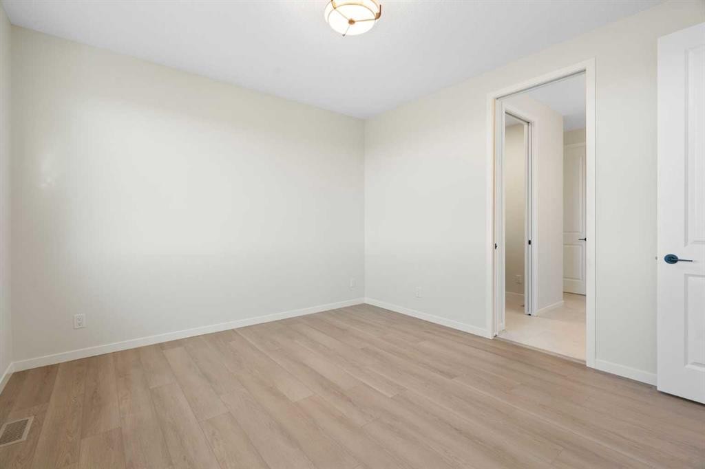 147 Marmot Grove Nw, Calgary, AB - Indoor Photo Showing Other Room