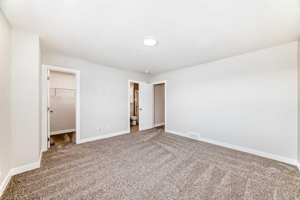 241 Bridgeport Gate, Chestermere, AB - Indoor Photo Showing Other Room
