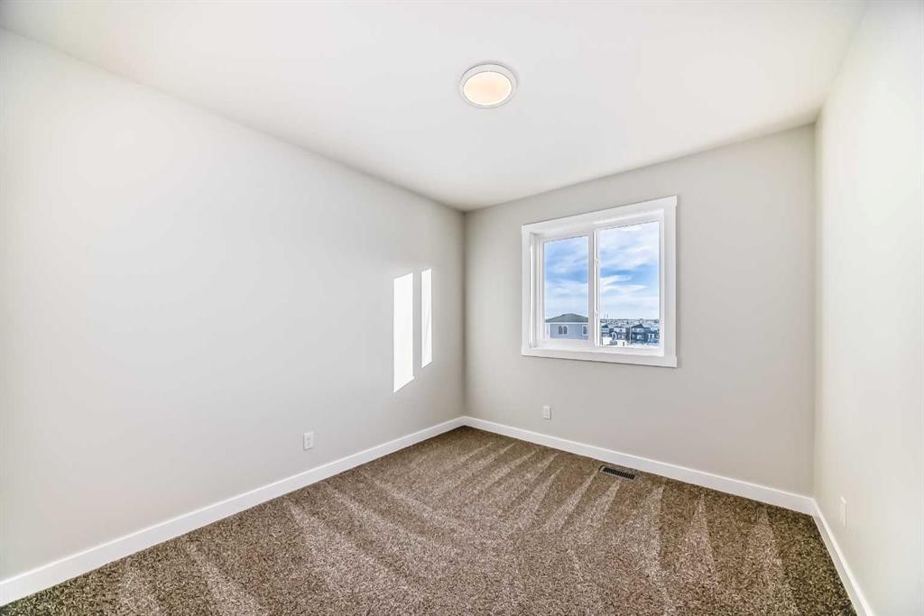 241 Bridgeport Gate, Chestermere, AB - Indoor Photo Showing Other Room