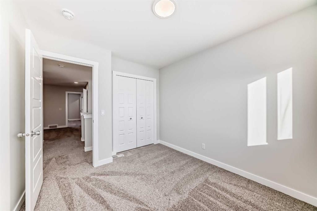 241 Bridgeport Gate, Chestermere, AB - Indoor Photo Showing Other Room