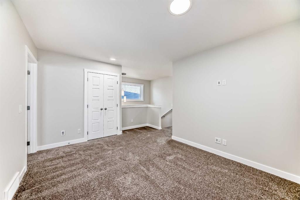241 Bridgeport Gate, Chestermere, AB - Indoor Photo Showing Other Room
