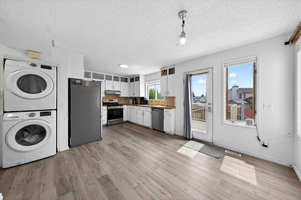 6979 Laguna Way Ne, Calgary, AB - Indoor Photo Showing Laundry Room